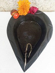 Picture of Natural Black Stone Lamp: Elegant Home Decor with 3 kg Weight and Half Litre Oil Capacity.